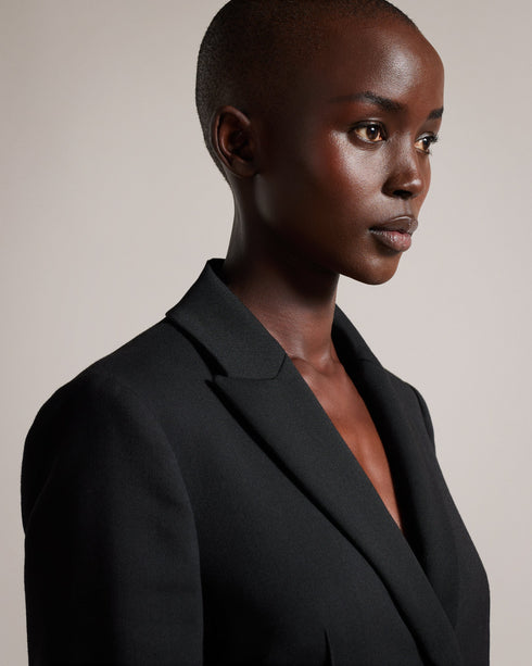 FRITTA-Jackets-The FRITTA blazer stands apart from the rest with its clean and simple design, bringing a sense of modern style to an otherwise classic item. Crafted from a soft cotton blend, it features a longline cut, a single button fastening and peaked lapel. Perfect for smart occasions, this versatile piece lends any outfit that extra edge. Blazer Longline Single button fastening Peaked lapel Pockets- Ted Baker Romania